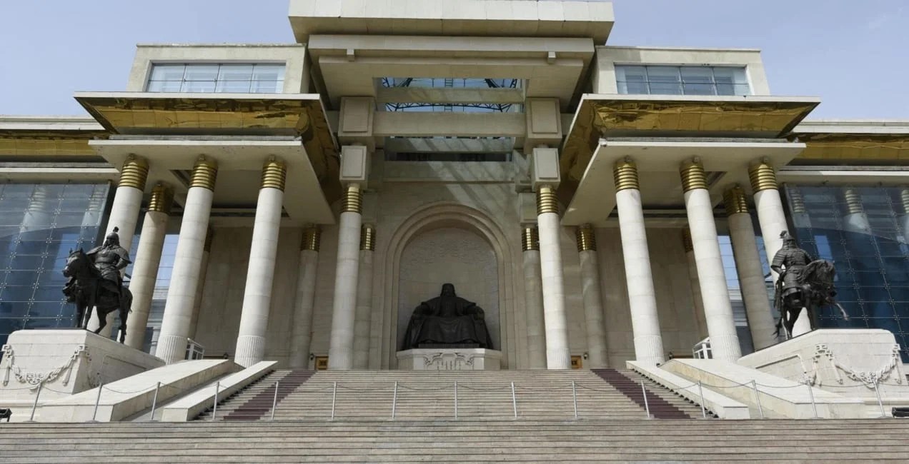 government building with columns and steps