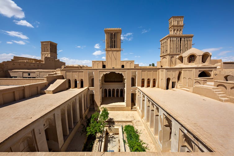 Historical Iranian houses, with strong lines, and built the colour of sand.