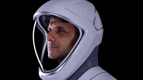 Axiom Space Group Captain Shukla on Wednesday morning in his space gear