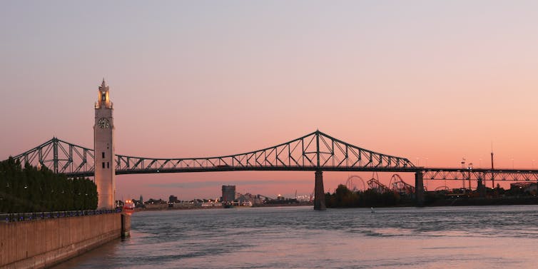 A steel bridge seen at sunset.
