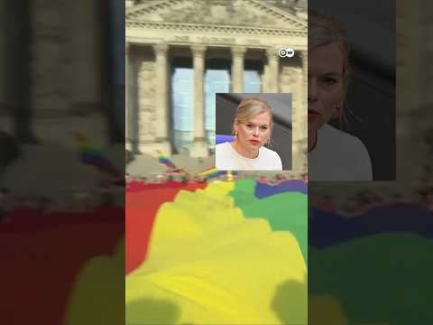 Huge rainbow flag placed at Reichstag by protesters ahead of Berlin Pride | DW News