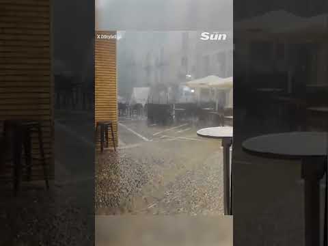 Spain storm & hail alert: 100mm of rain in 1 hour hits tourist hotspot #spain #rain #storm #hail