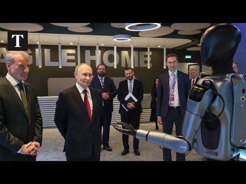 Putin Stares Down Dancing Robot in Moscow