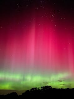 A phone photo of an aurora during the great display of May 2024.