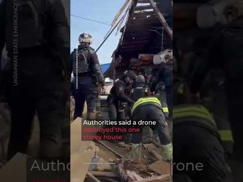 Woman pulled from rubble after Russian drone strike in Ukraine