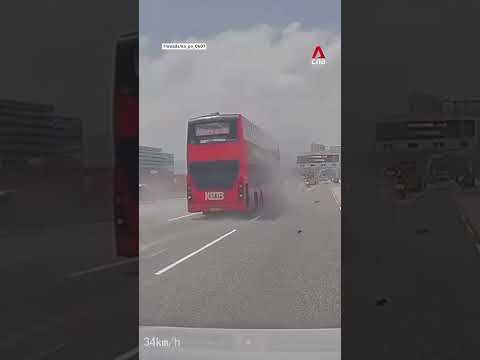 At least 24 injured after Hong Kong bus crashes into highway maintenance truck