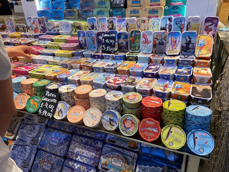 A pile of sardine tins