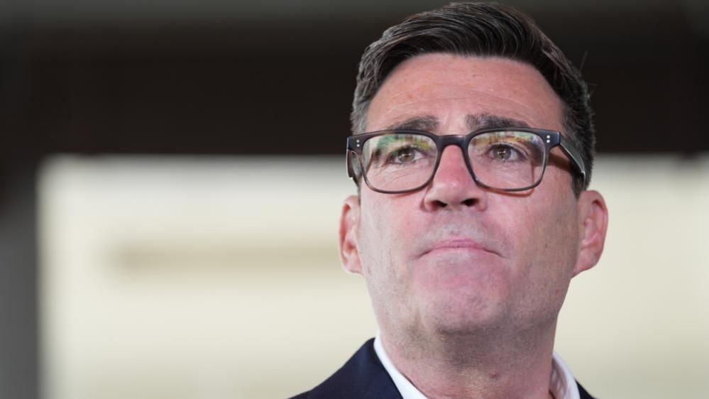Close-up image of newly confirmed Labour Party leader Andy Burnham, wearing dark glasses
