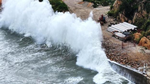 China evacuates one million from homes as massive storm arrives