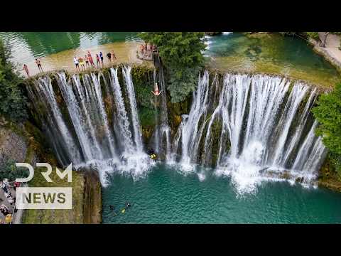 Daring Divers Leap From Bosnia Waterfall In Death Defying Contest | DRM News | AQ1F