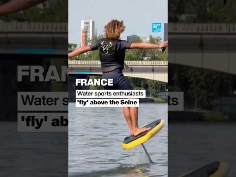 France: Water sports enthusiasts'fly' above the River Seine • FRANCE 24 English
