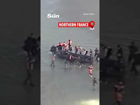 Shocking moment small boat migrants on French beach attack cops as they try to set sail to Britain