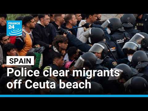 Spain's police launch operation to clear migrants off Ceuta beach • FRANCE 24 English