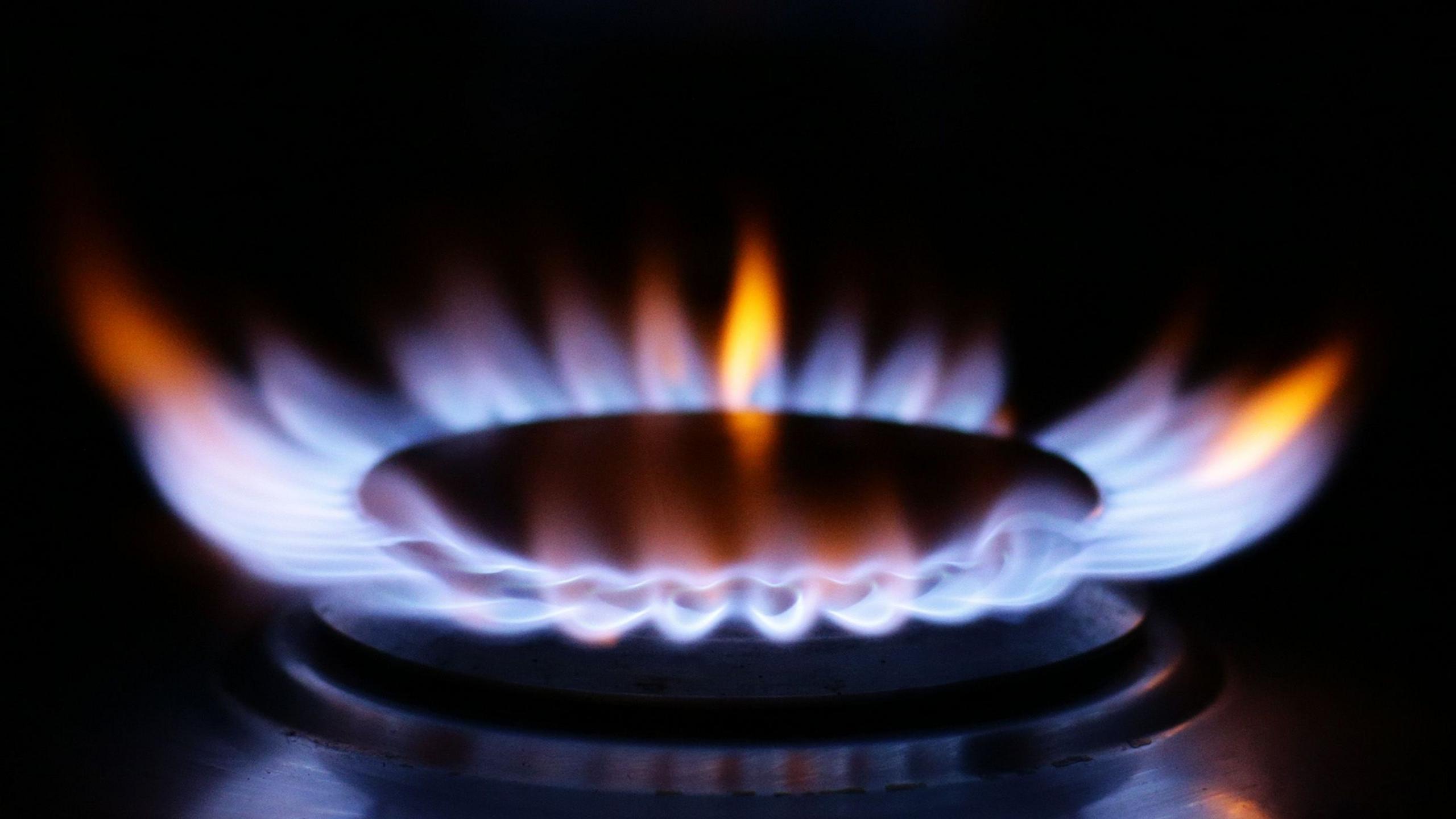 A close up shot of a lit ring on a gas hob